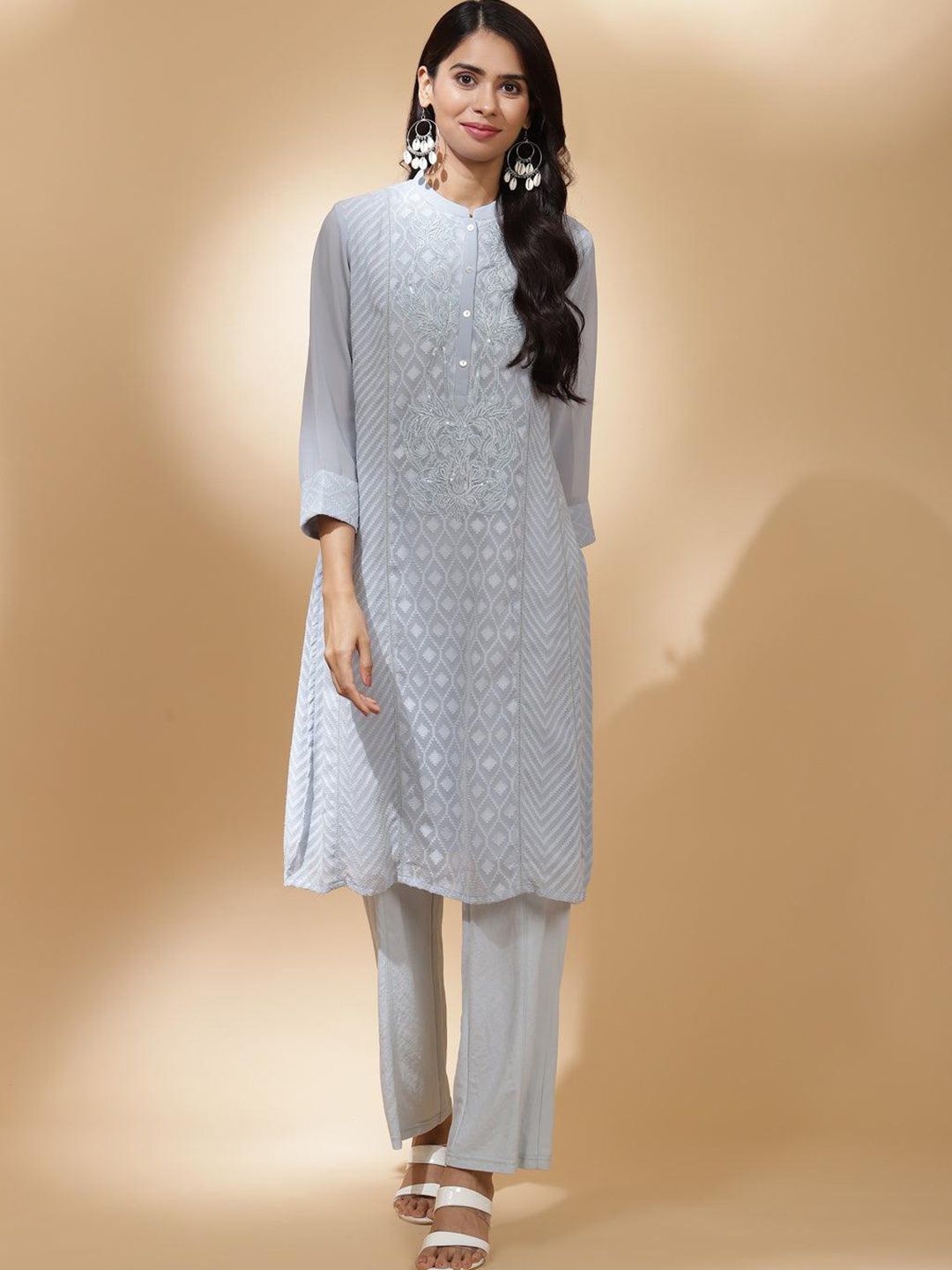 

Lakshita Women Blue Yoke Design Thread Work Georgette Anarkali Kurta