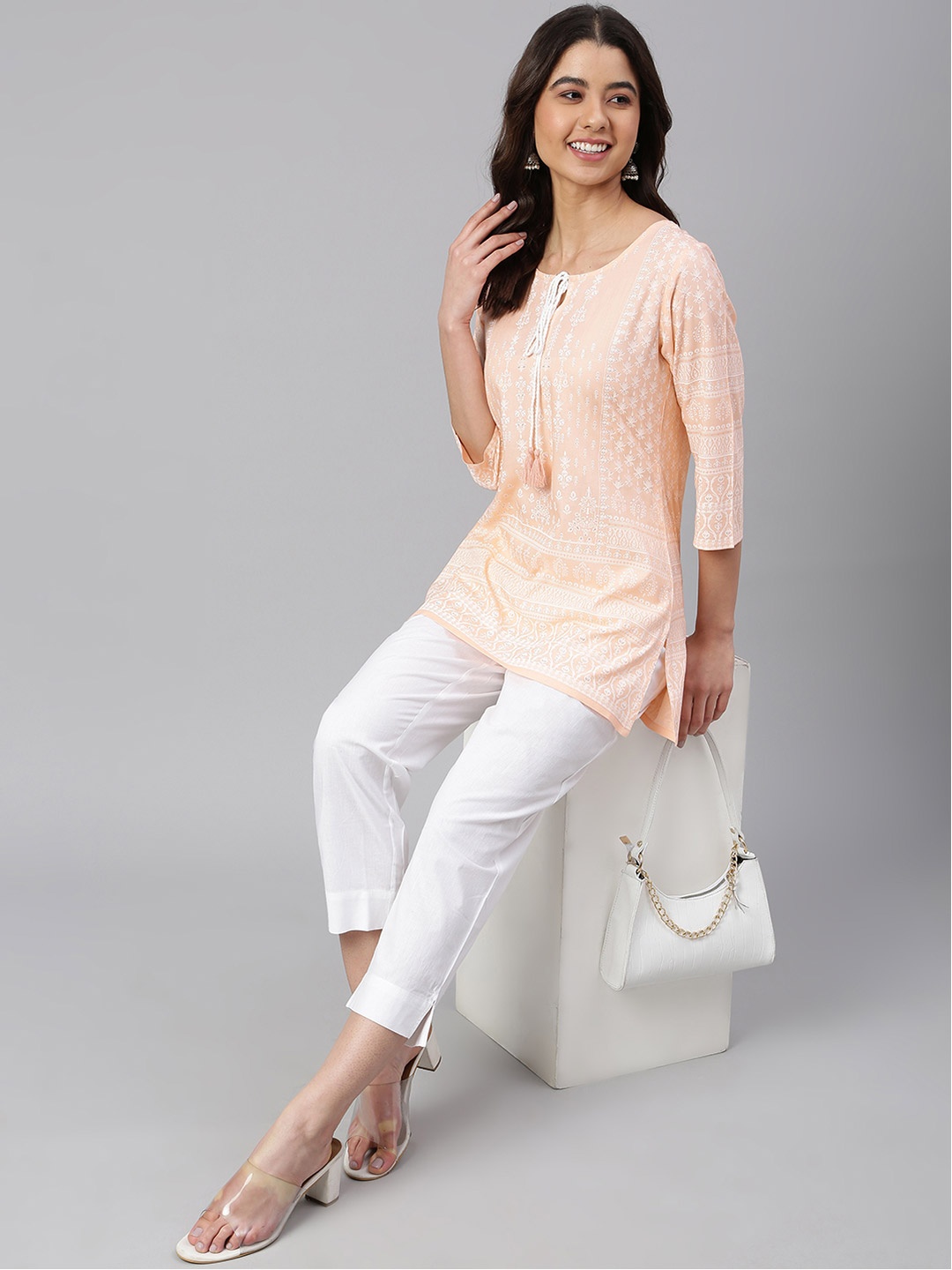 

Janasya Women Peach-Coloured & White Printed Tunic