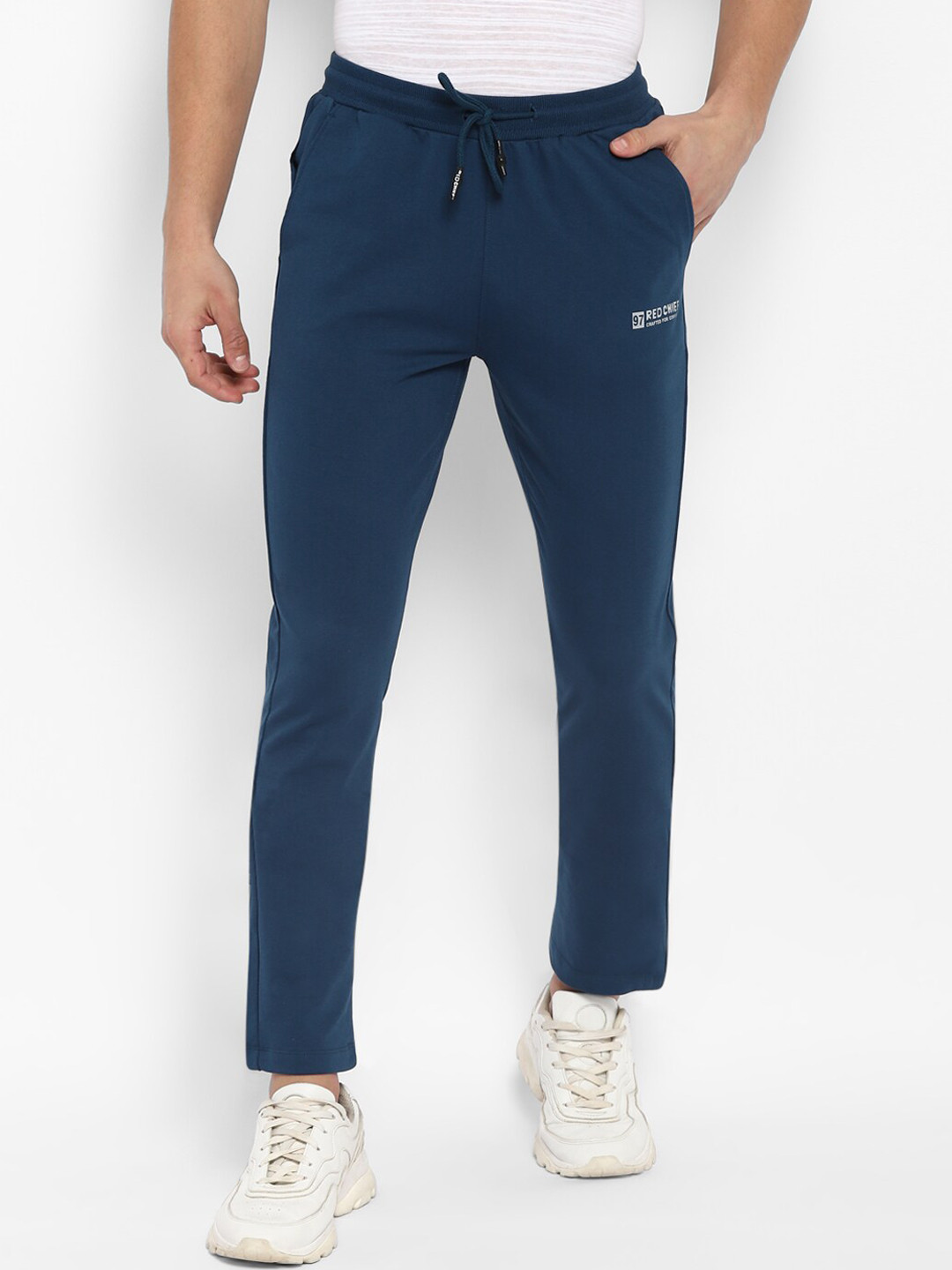 

Red Chief Men Teal Solid Cotton Track Pants