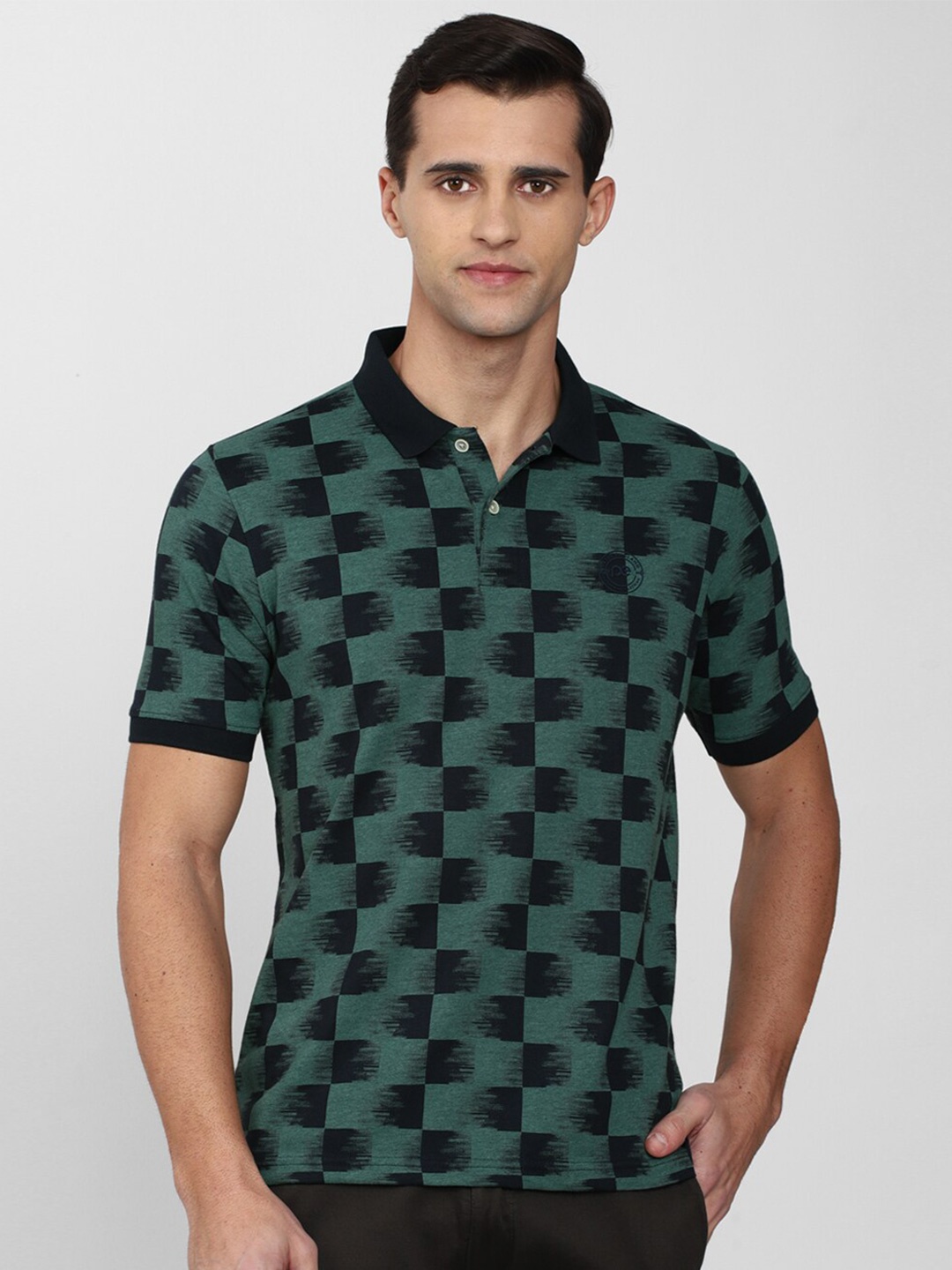 

Peter England Casuals Men Green & Black Printed Polo Collar T-shirt