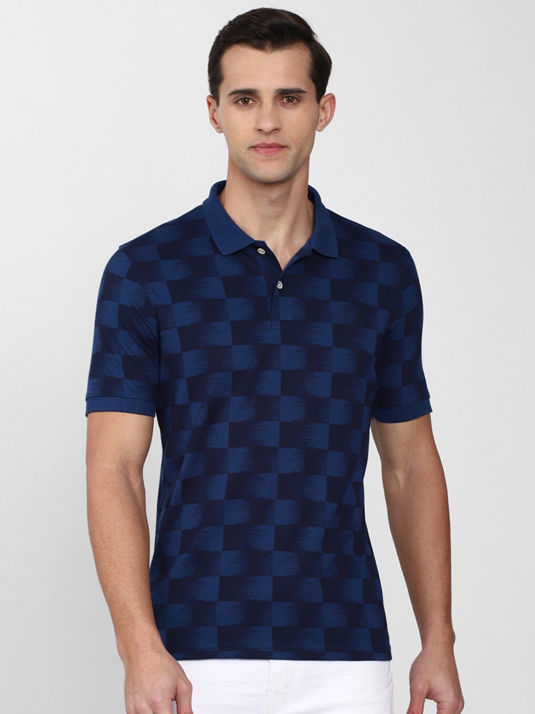 

Peter England Casuals Men Blue Printed Polo Collar T-shirt
