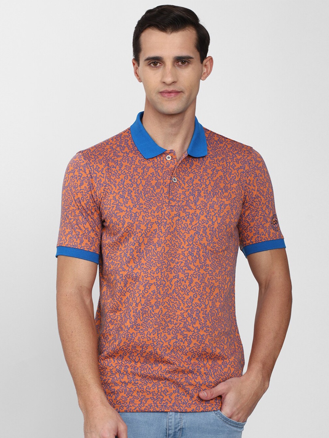 

Peter England Casuals Men Orange & Blue Printed Polo Collar T-shirt