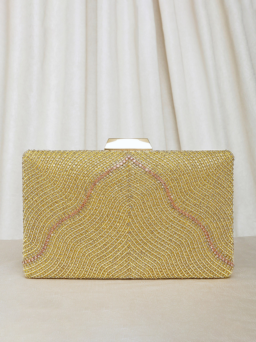 

Peora Women Gold Clutches