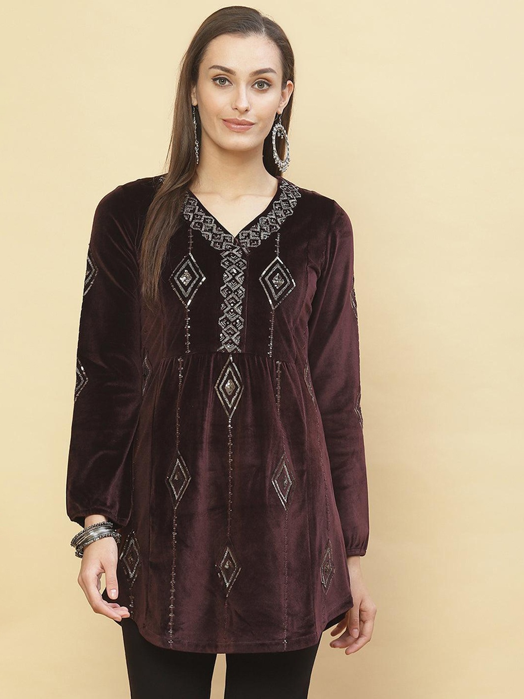 

Lakshita Brown Ethnic Motifs Embroidered V-Neck Sequinned Velvet Sequinned Empire Kurti