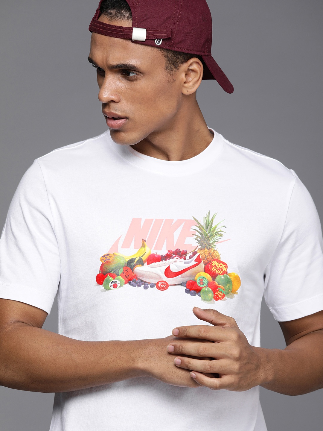 

Nike Men White & Peach-Coloured Photo Printed Pure Cotton T-shirt