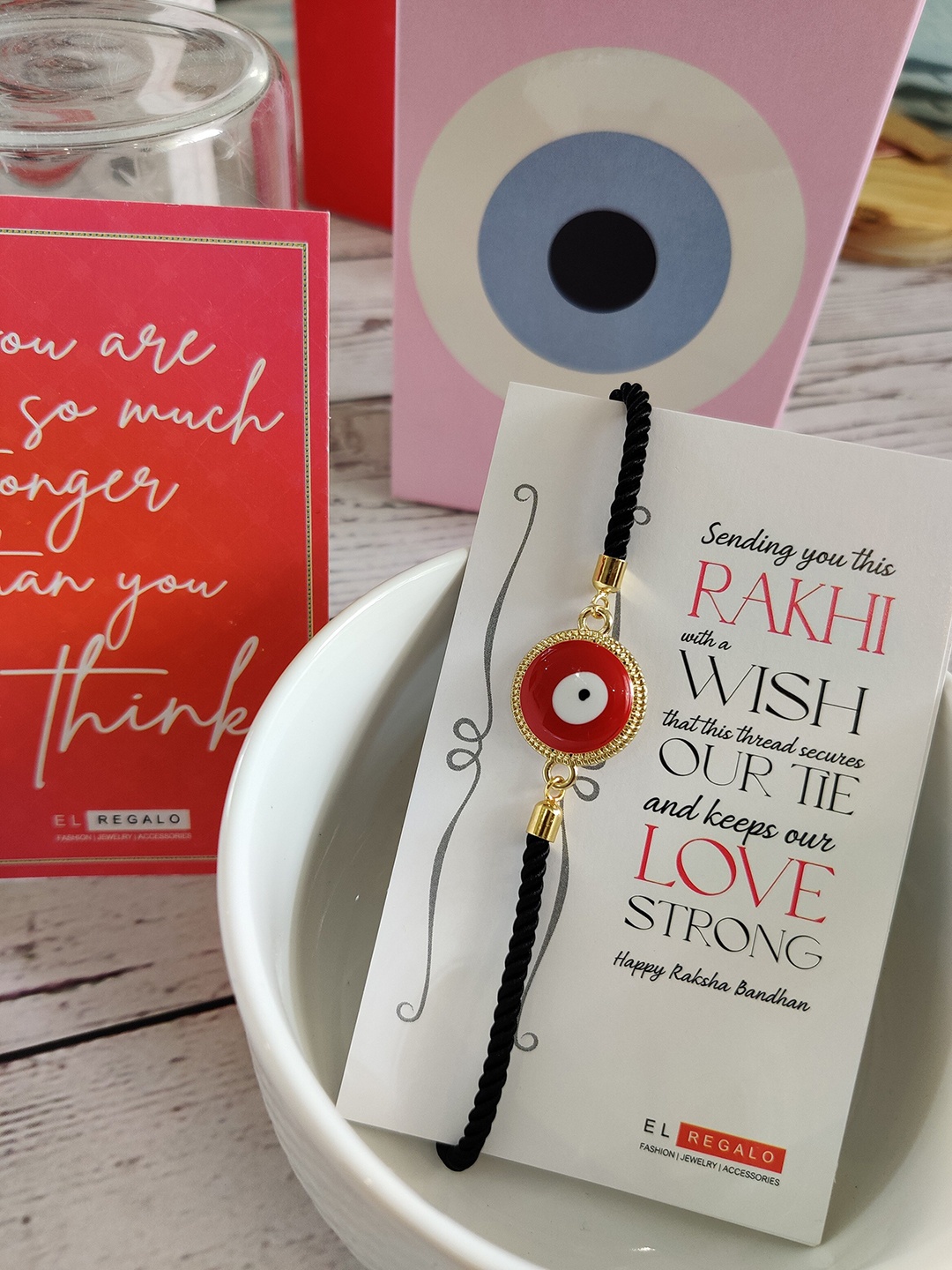 

EL REGALO Red & White Rakhi with Card and Roli Chawal