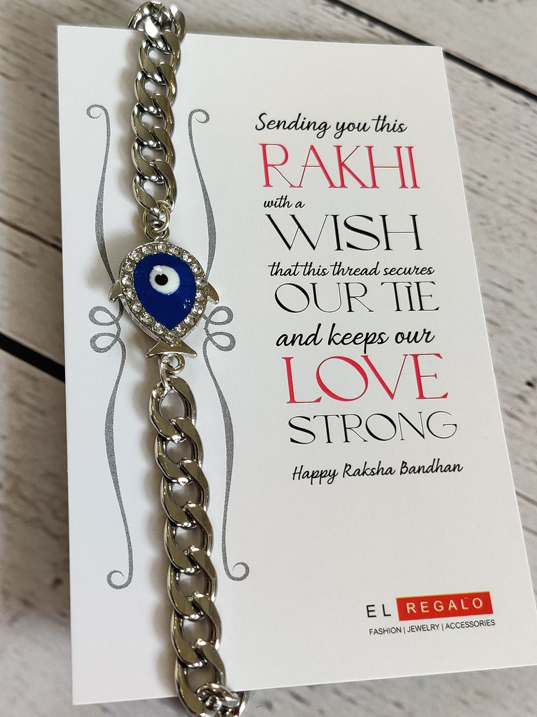 

EL REGALO Stainless Steel bracelet Style Rakhi for Bhai with Card & Roli Chawal, Silver