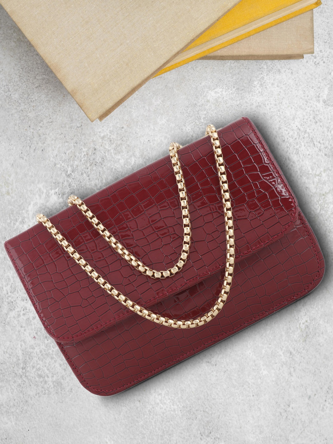 

LEKHX Women Maroon Textured PU Structured Sling Bag