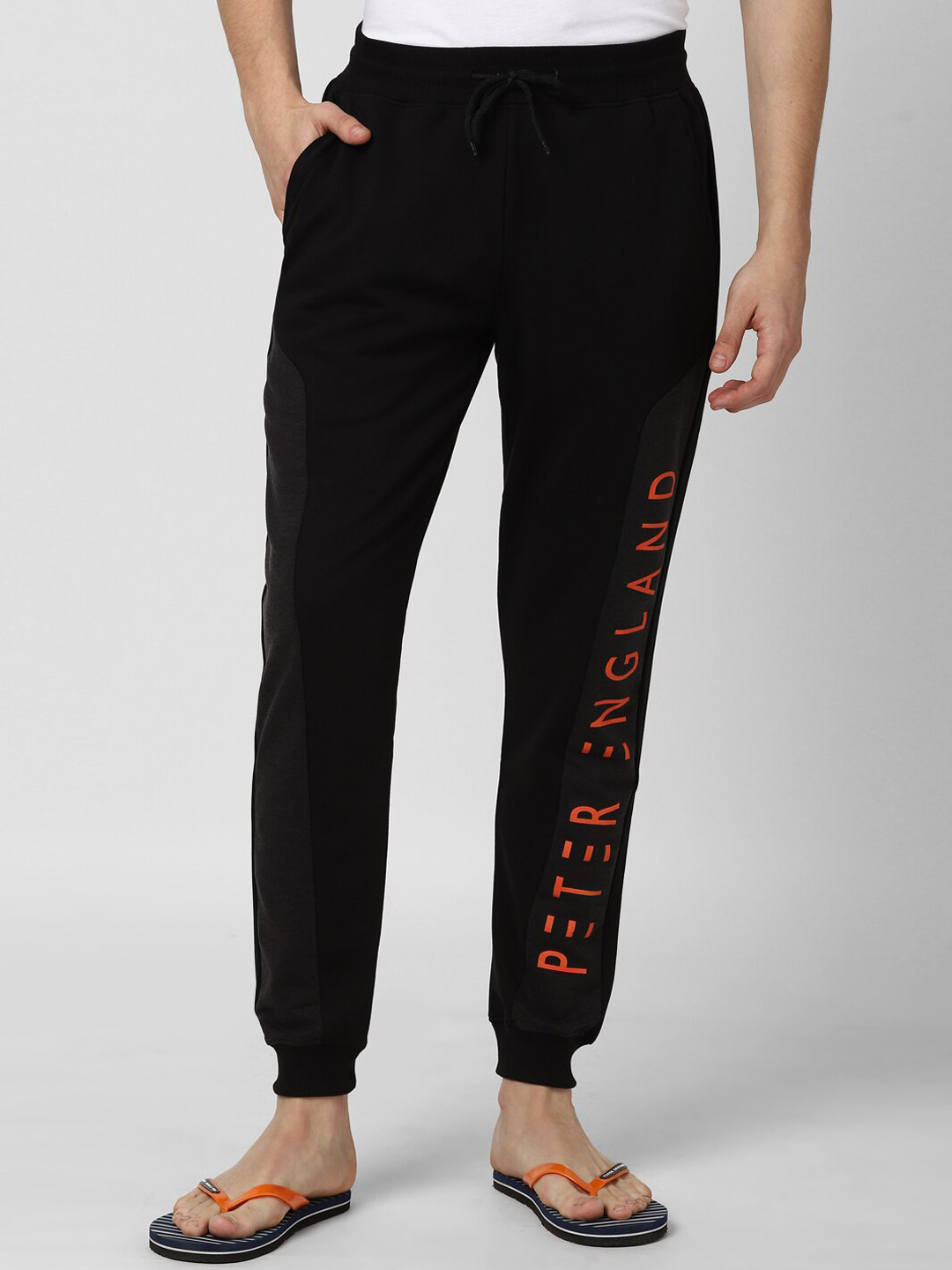 

Peter England Men Black & Red Brand Logo Printed Cotton Lounge Pants