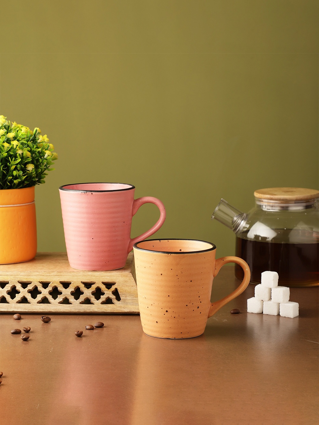 

The Decor Mart Yellow & Pink Set of 2Textured Ceramic Matte Mugs 300 ML
