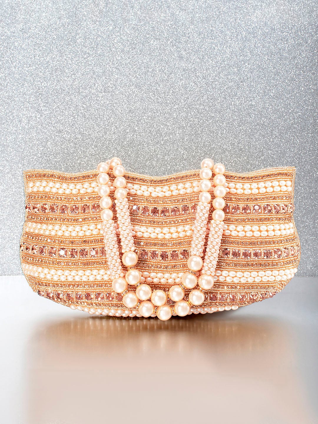 

Peora Women Rose Gold Clutches