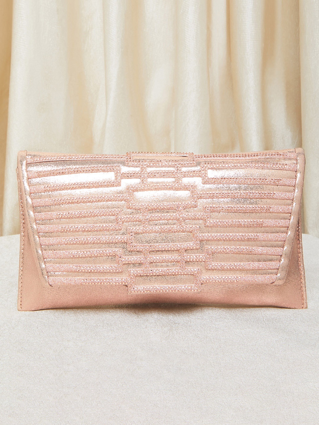 

Peora Women Rose Gold Clutches