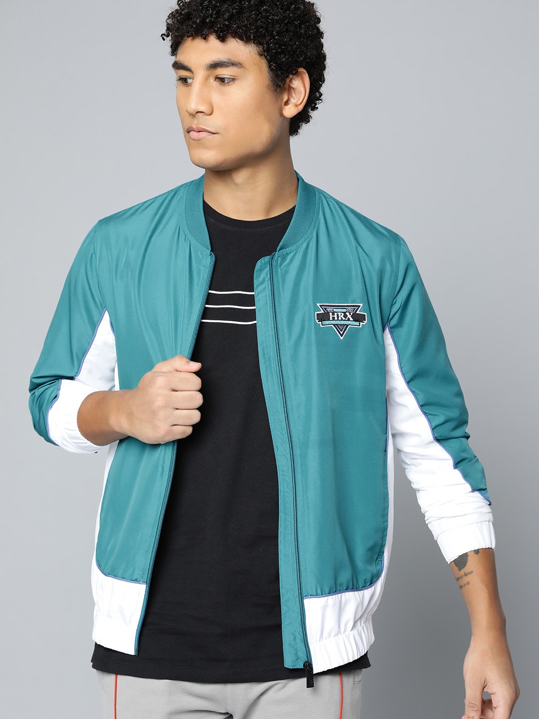 

HRX by Hrithik Roshan Men Teal Green Solid Sporty Jacket