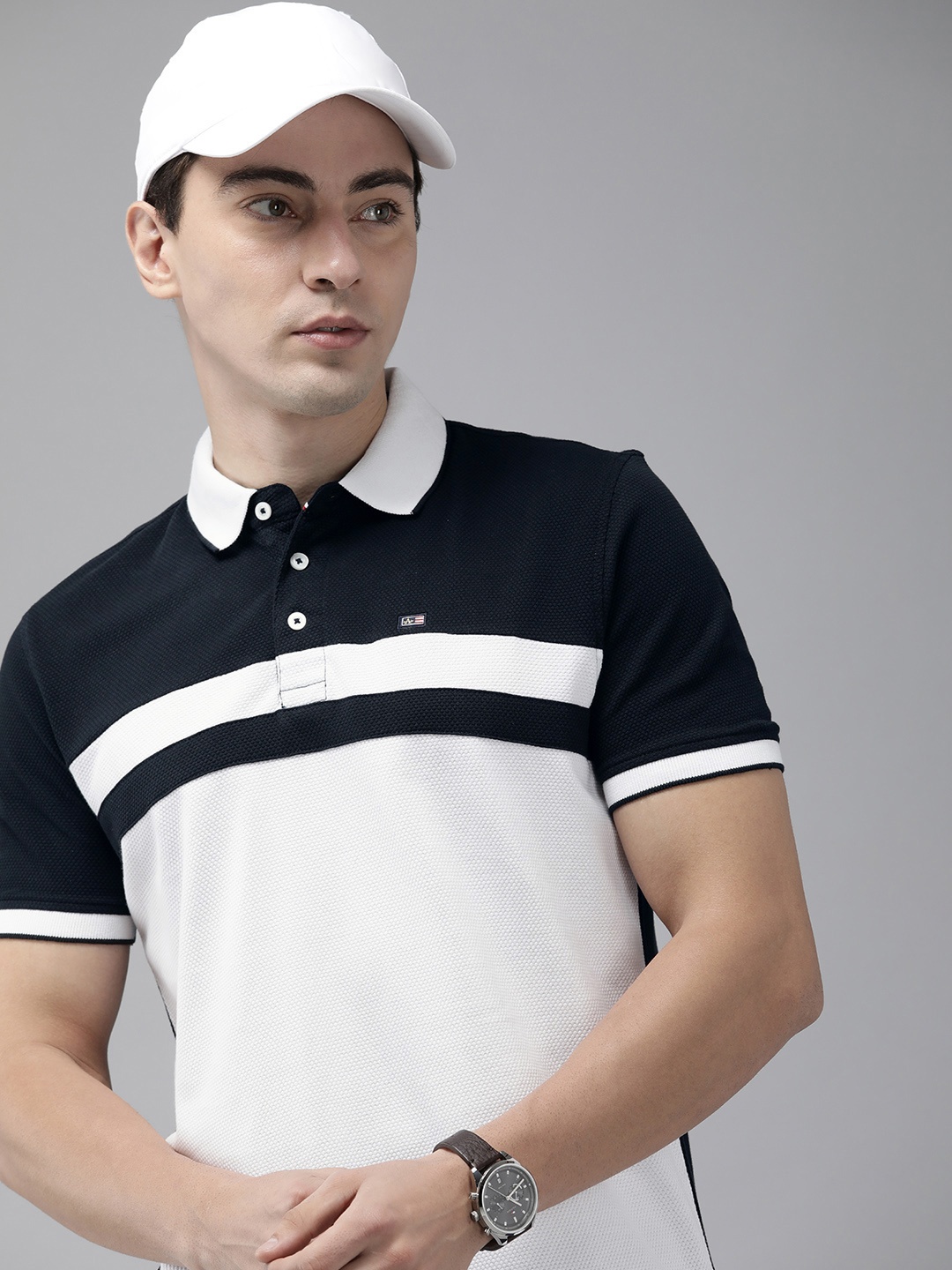 

Arrow Sport Men Navy Blue & White Colourblocked Polo Collar Pure Cotton T-shirt