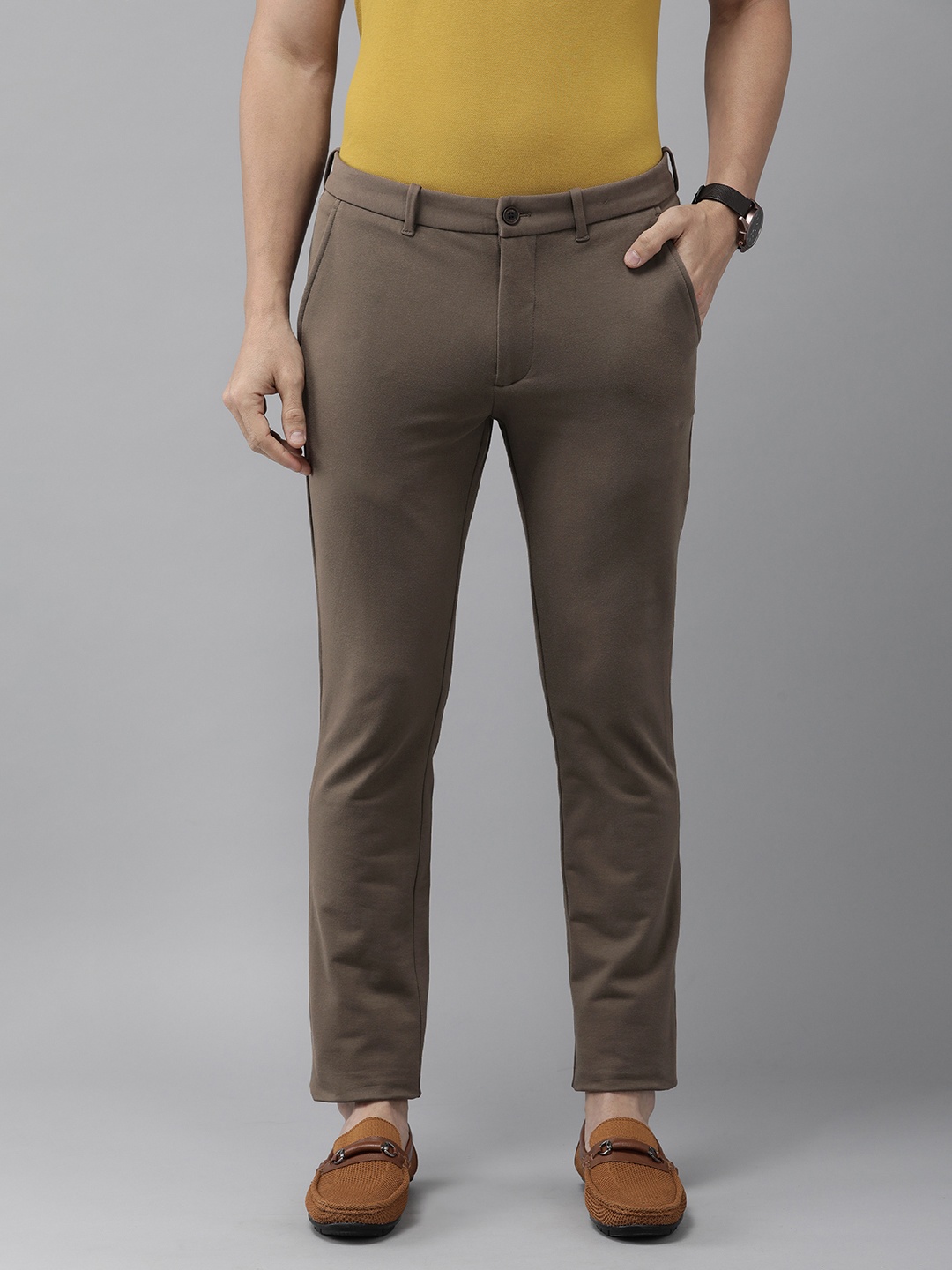 

Arrow Sport Men Brown Solid Mid Rise Original Slim Fit Regular Trousers