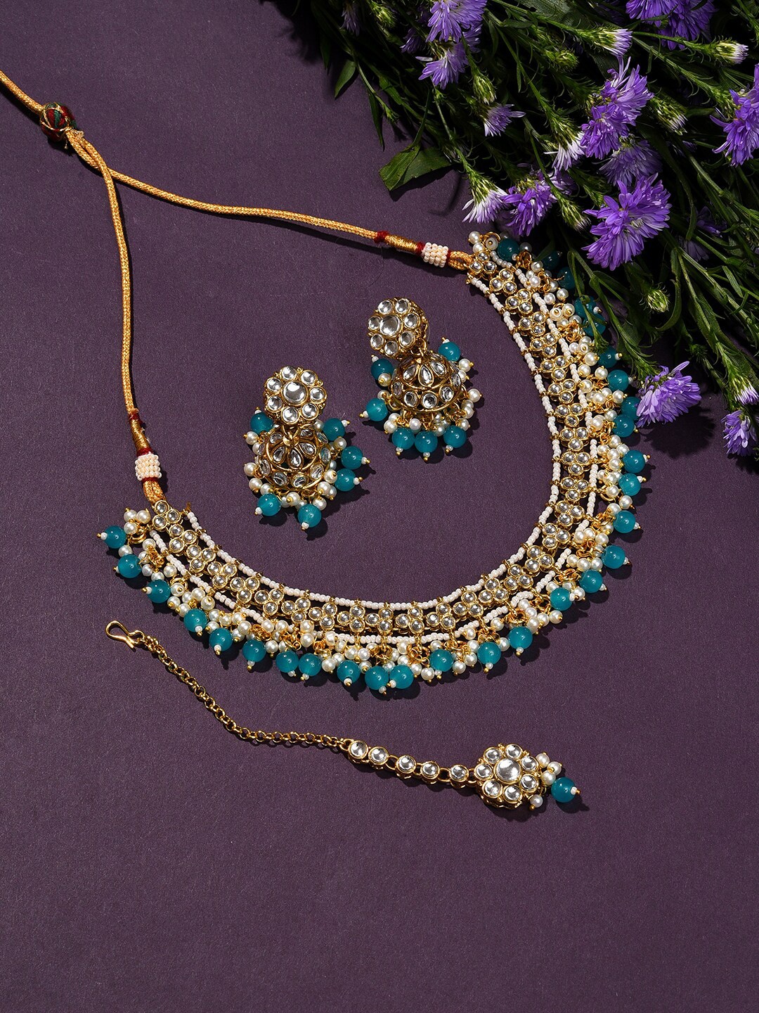 

SOHI Gold-Plated Blue & White Stone-Studded & Beaded Jewellery Set