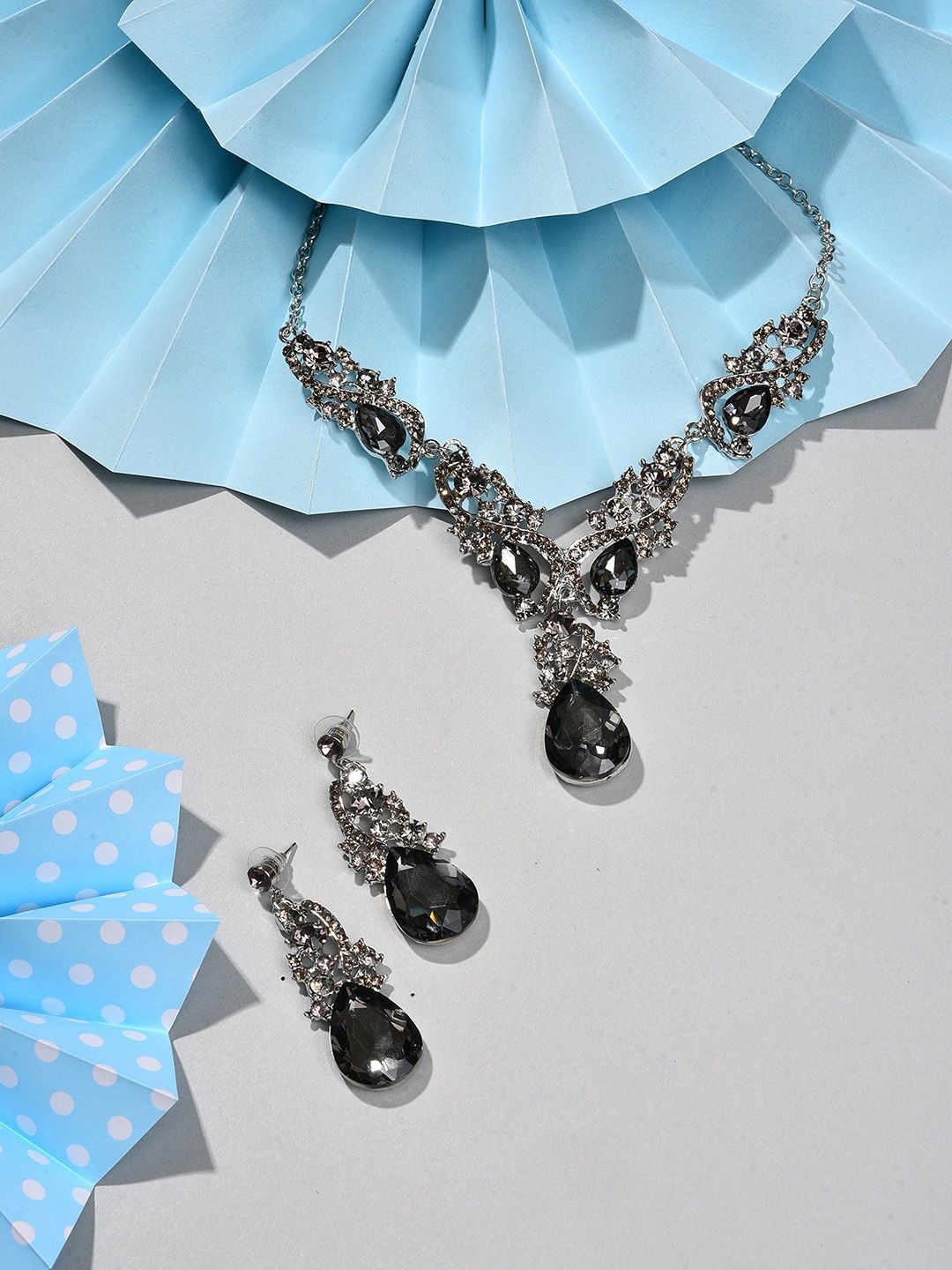 

SOHI Women Black & Silver-Plated Stone Studded Jewellery Set