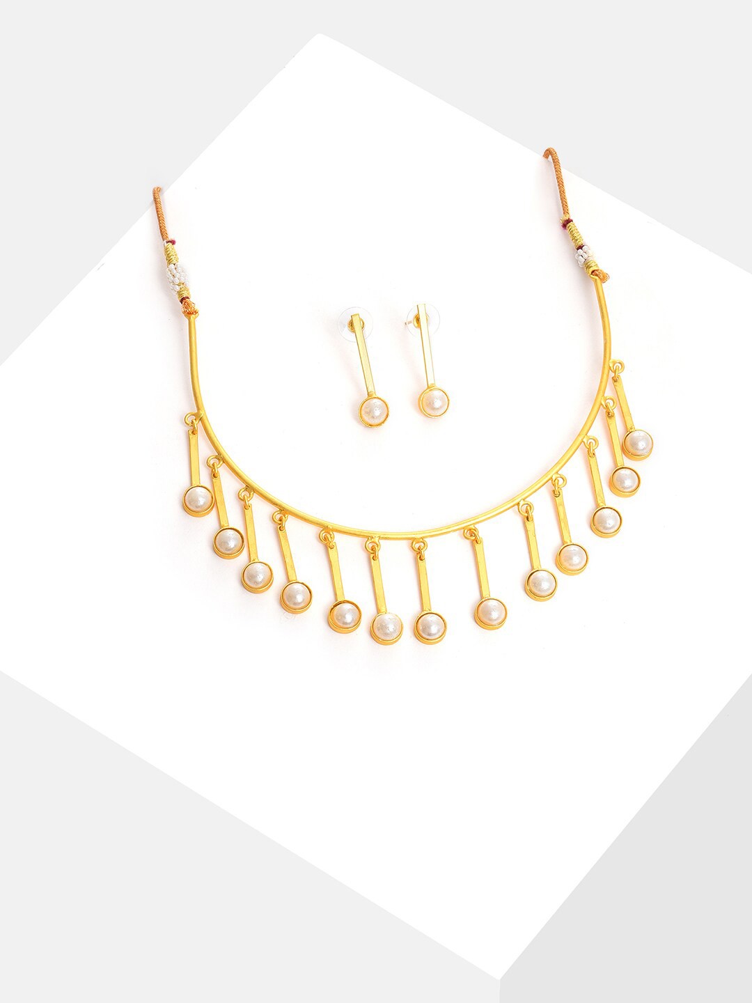 

SOHI Gold Plated Pearl Studded Taselled Jewellery Set