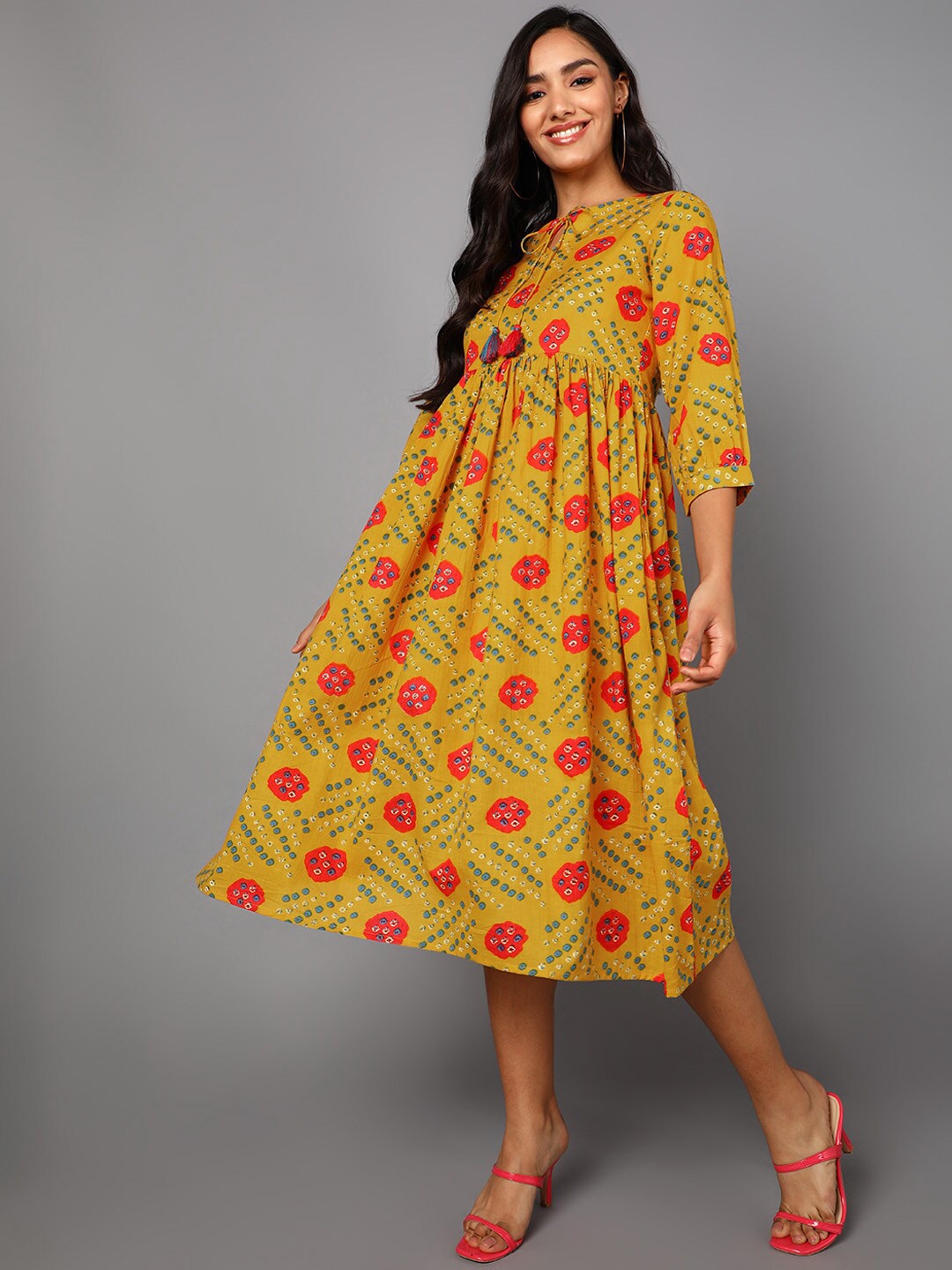 

AHIKA Yellow Ethnic Motifs Tie-Up Neck Empire Midi Dress