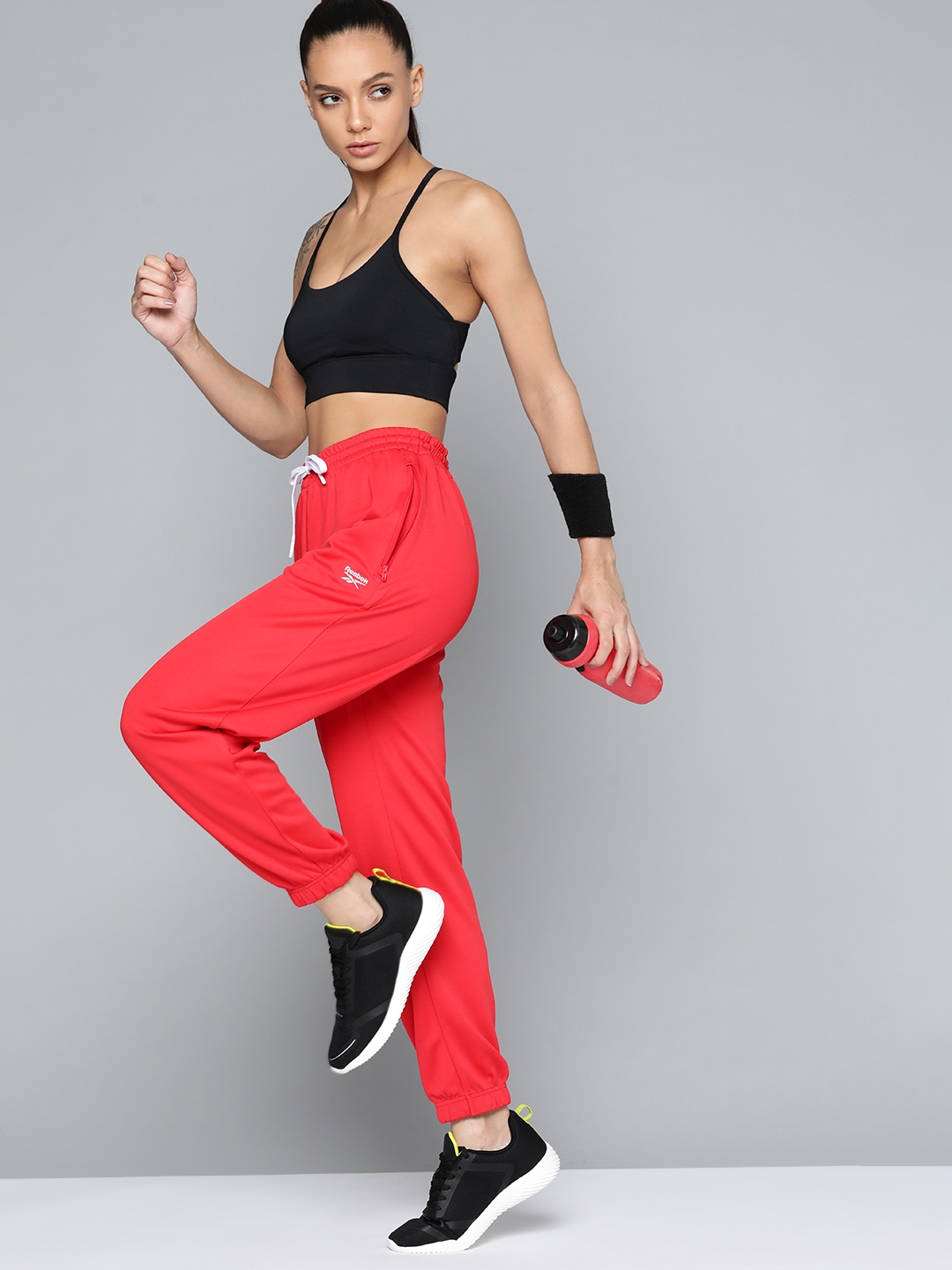 

Reebok Women Red Speed Wick technology Solid Training Joggers