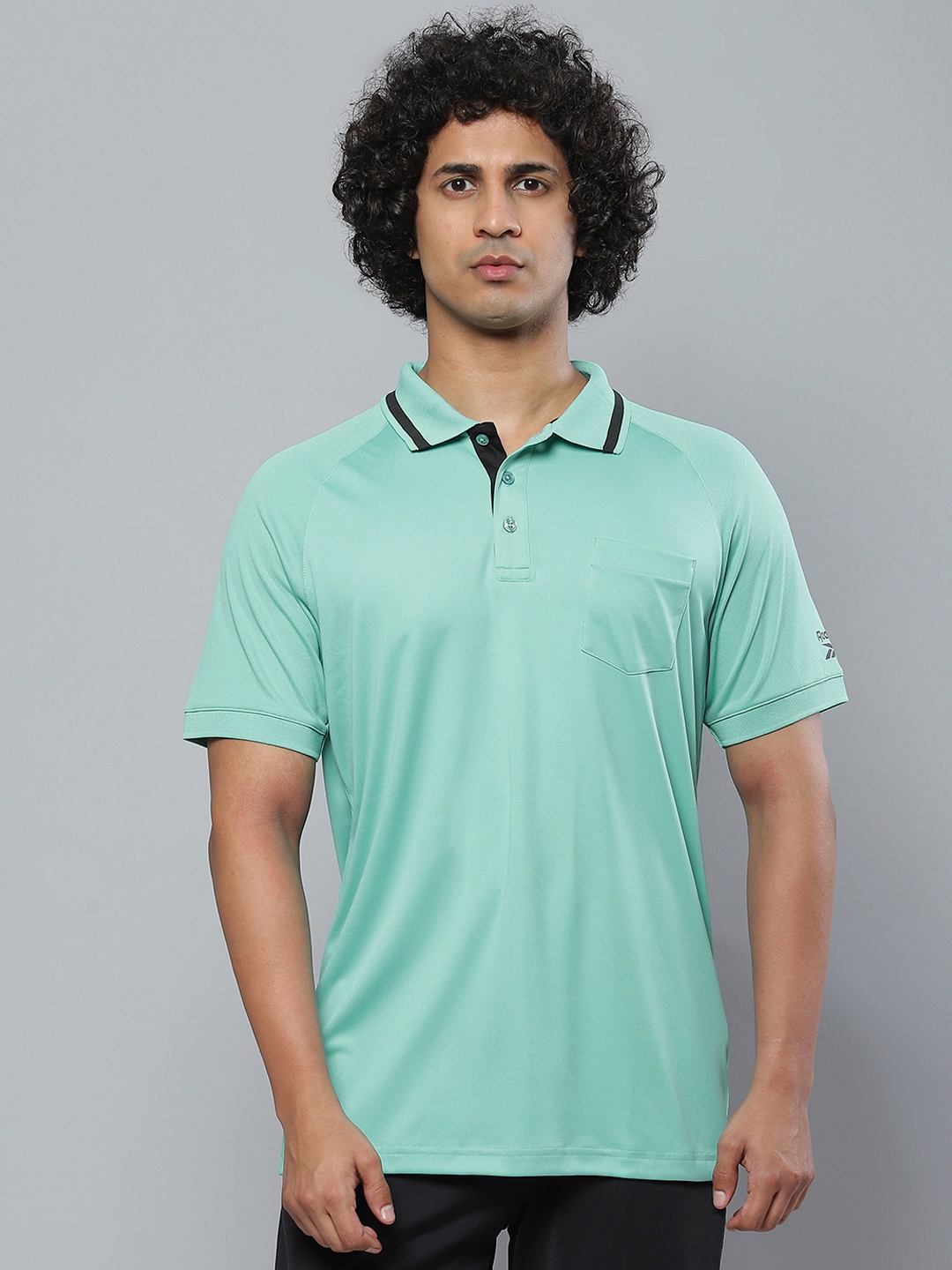 

Reebok Men Blue Printed Polo Collar Slim Fit T-shirt