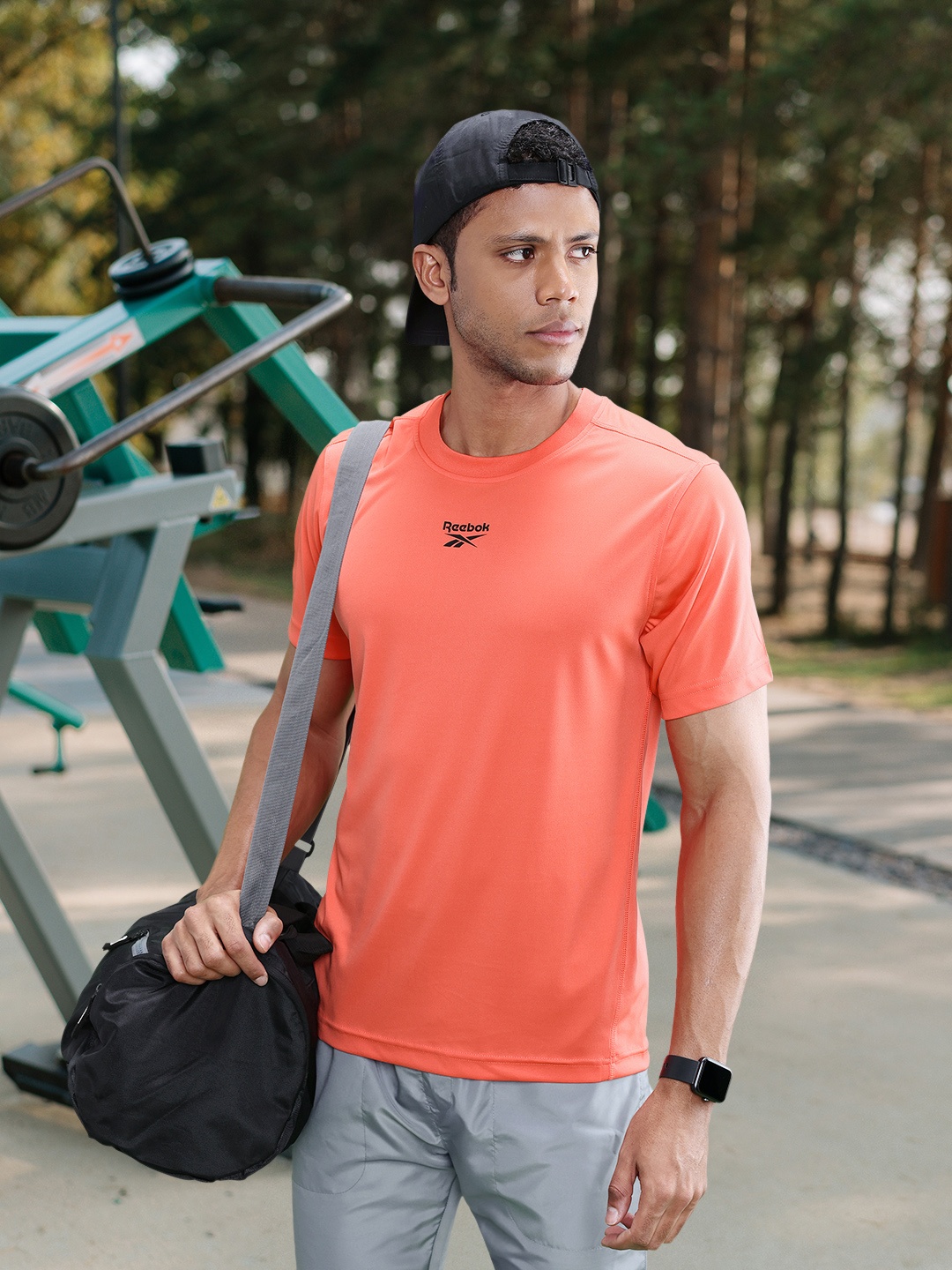 

Reebok Men Brand Logo Printed Training Speedwick T-shirt, Orange