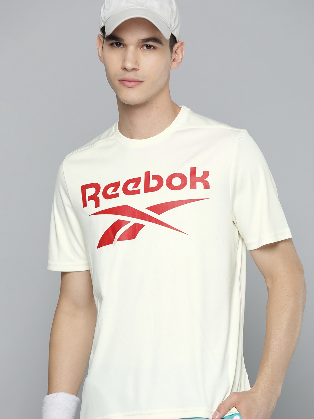 

Reebok Men White & Red Store Staff Brand Logo Printed Slim Fit T-shirt