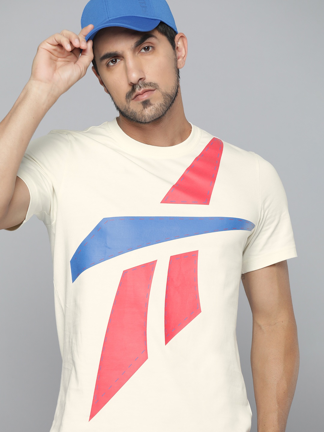 

Reebok Classic Men Cream-Coloured & Red Brand Logo Printed Polo Collar Pure Cotton T-shirt