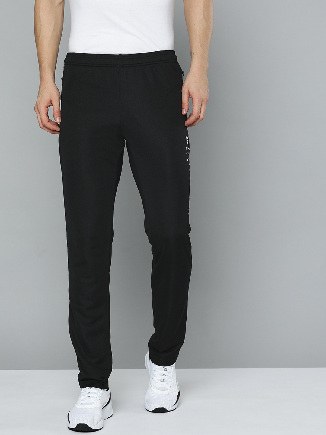 

Reebok Men Black Solid ADV Track Pants