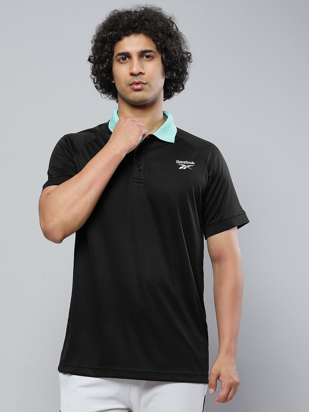 

Reebok Men Black Polo Collar T-shirt