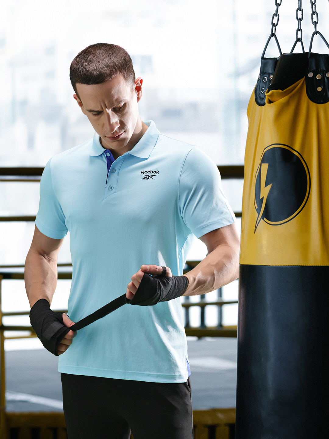 

Reebok Men Brand Logo Printed Polo Collar Speedwick T-shirt, Blue