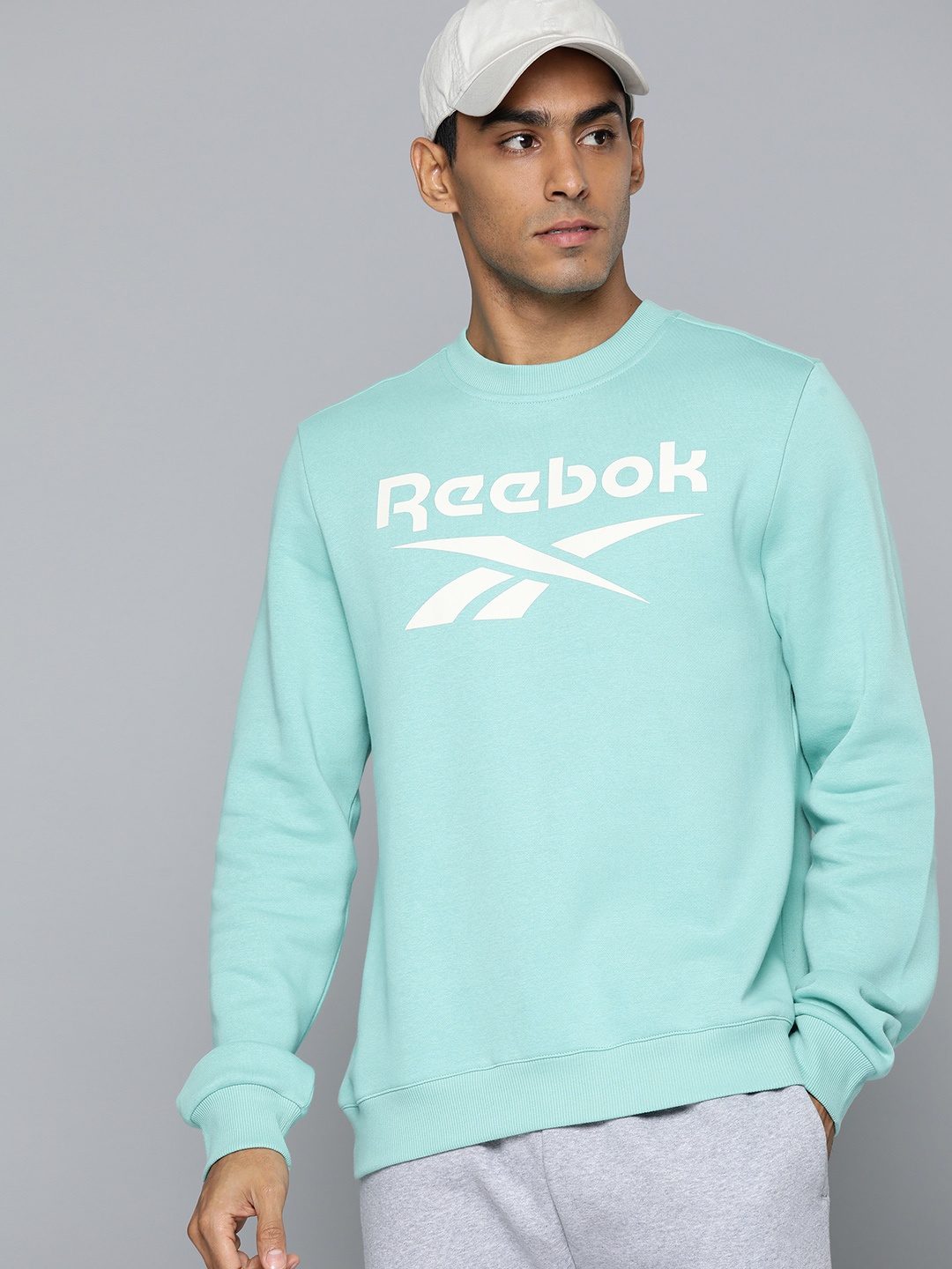 

Reebok Men Fitness RI FLC Brand Logo Crew Sweatshirt, Sea green