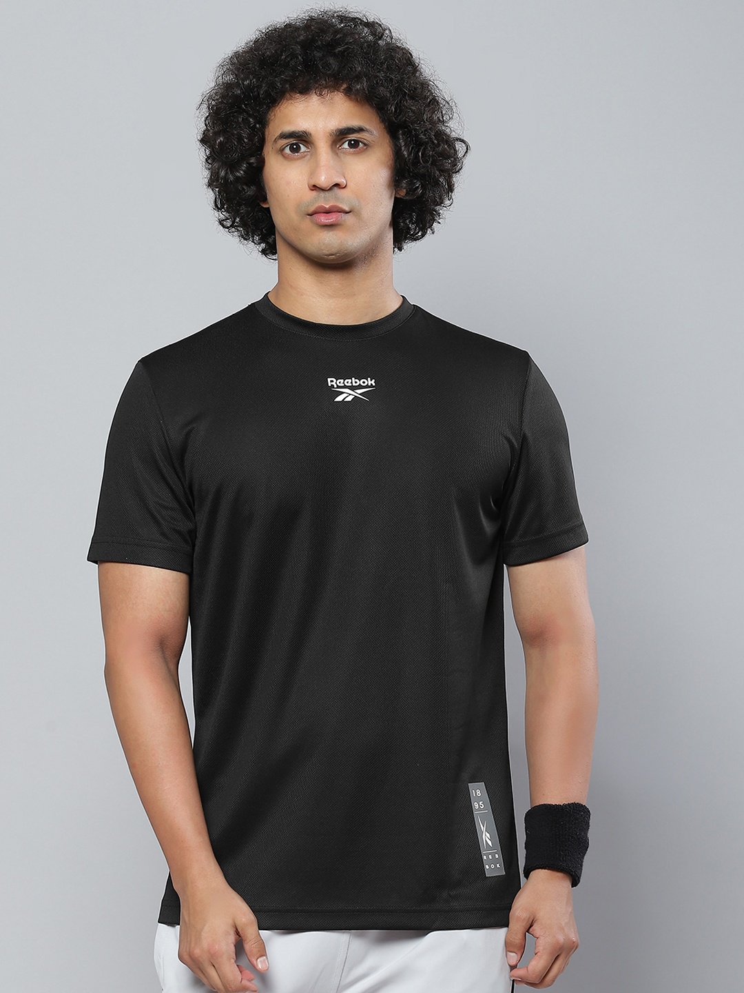 

Reebok Men Black T-shirt