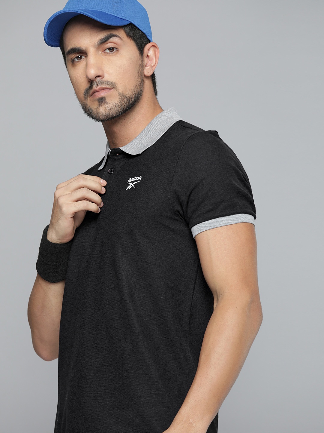 

Reebok Men Black FND NEO Brand Logo Printed Polo Collar Pure Cotton T-shirt