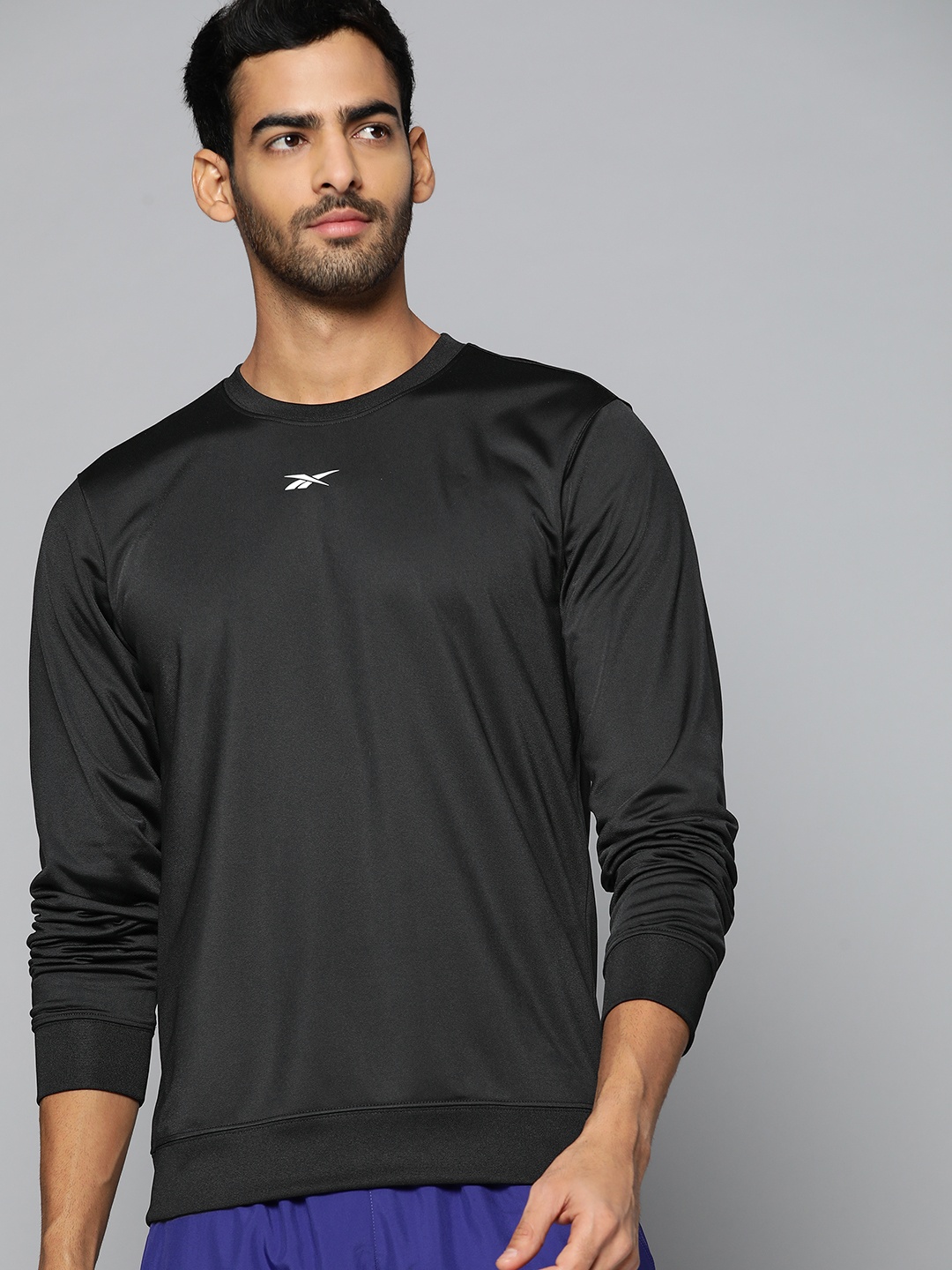 

Reebok Men Black Solid FND Training Sweatshirt