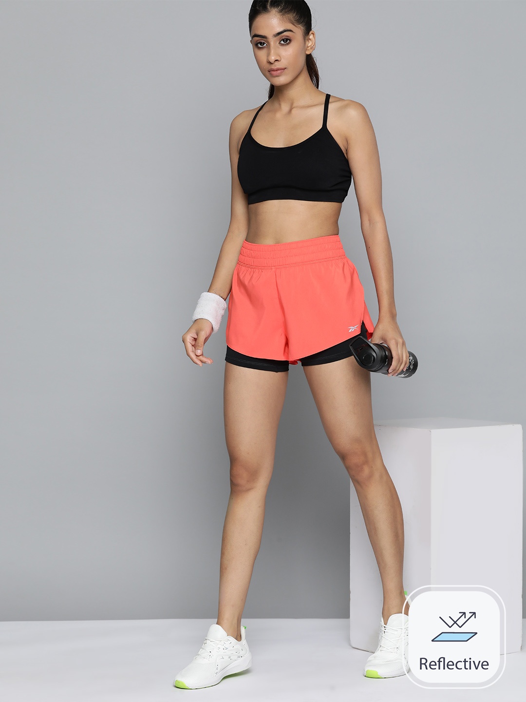 

Reebok Women WOR Run 2 in 1 Sports Shorts, Coral