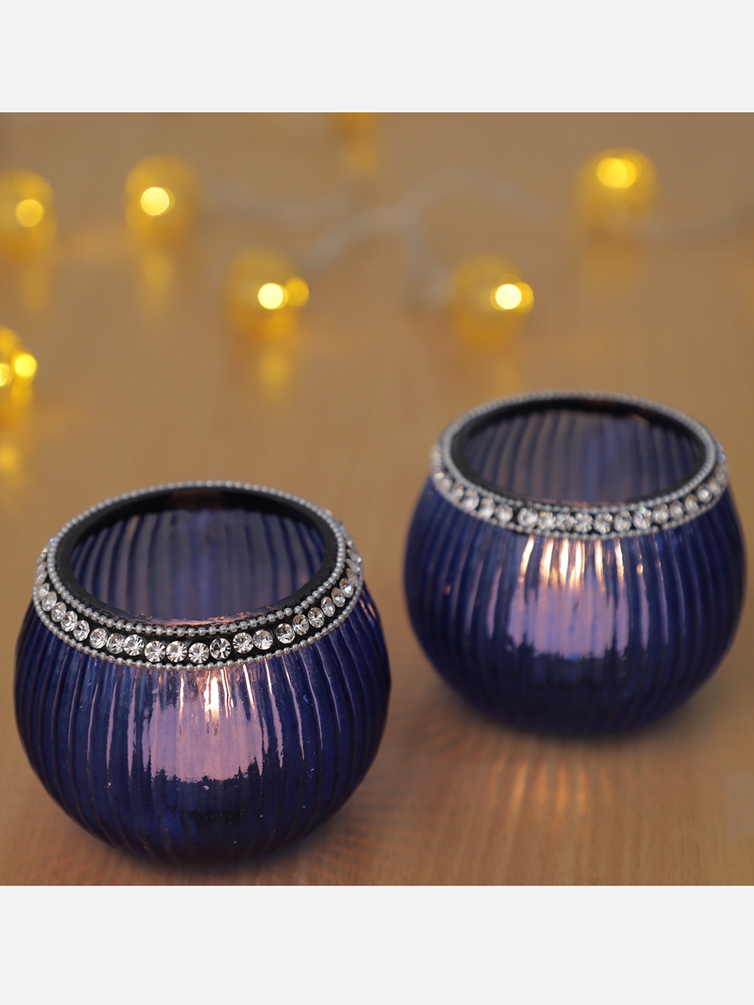

HomeTown Set of 2 Violet Textured Glass Candle Holders