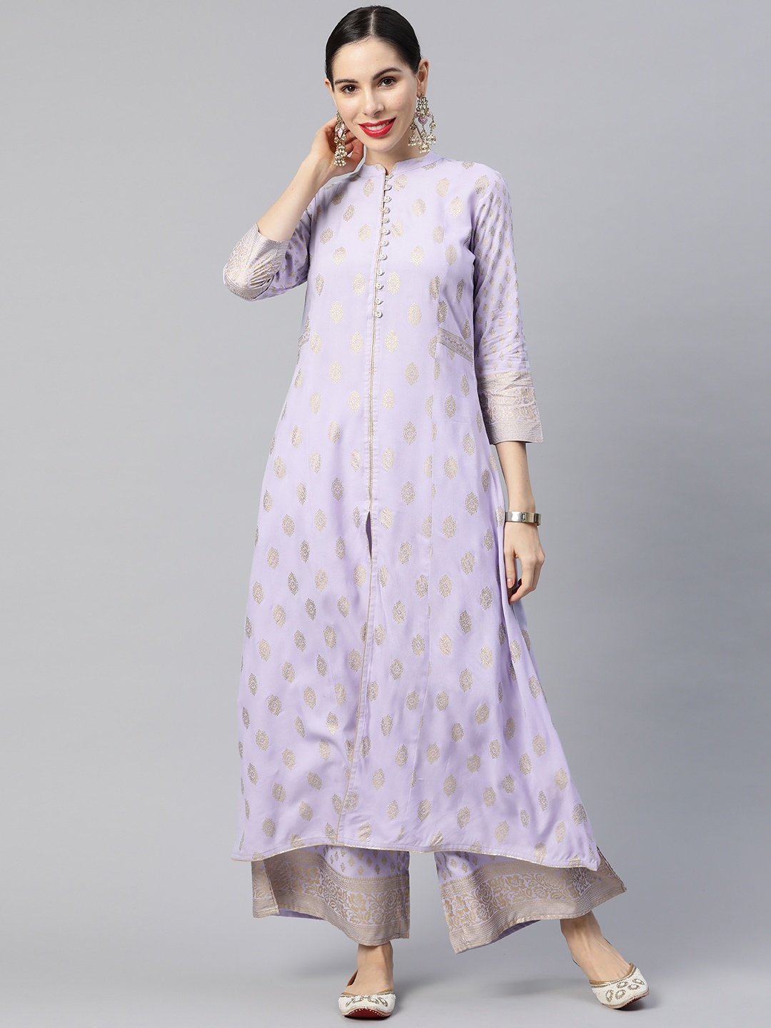 

Ramas Women Lavender & Golden Ethnic Motifs Printed High Slit A-Line Kurta with Palazzos