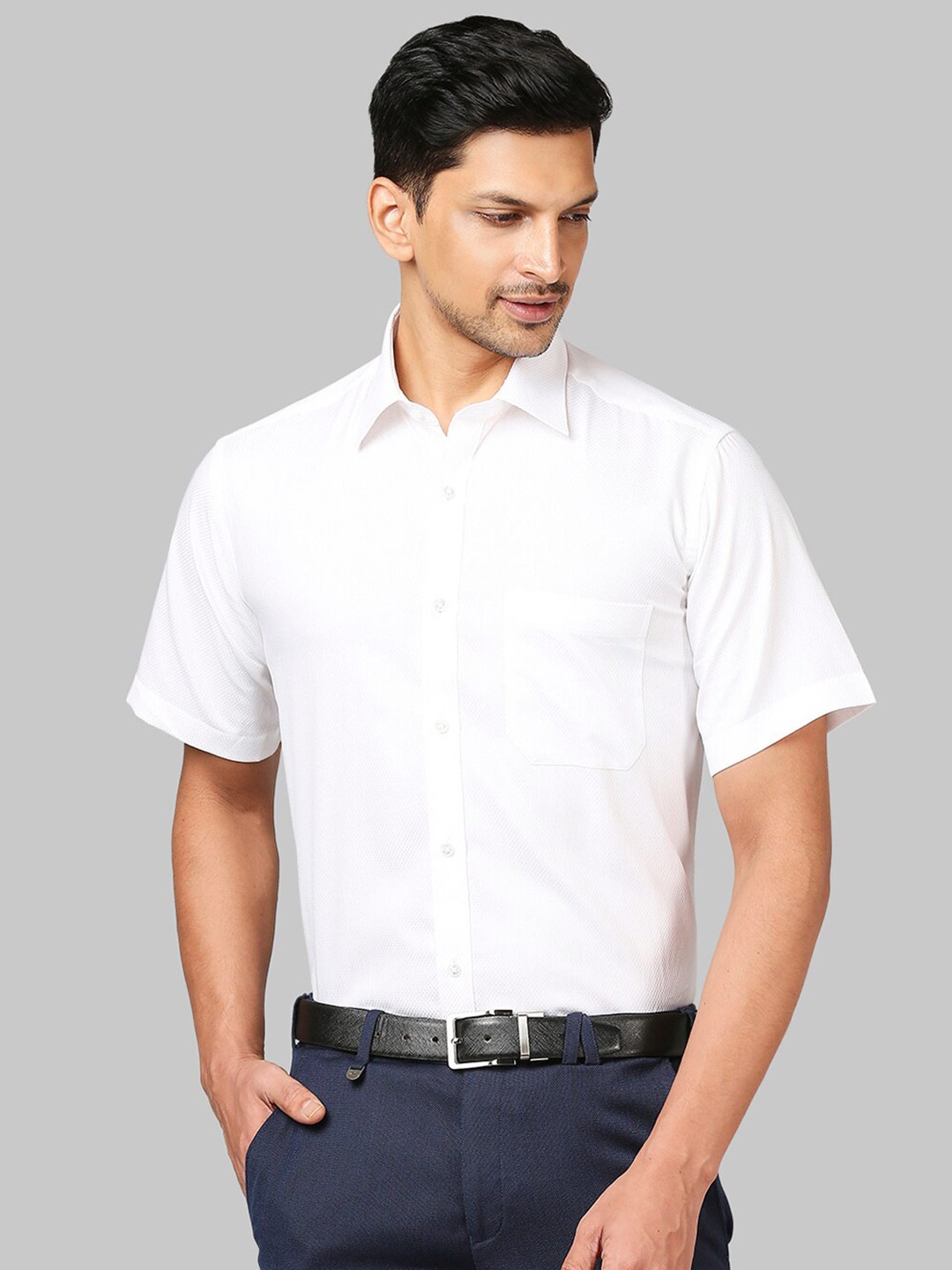 

Raymond Men White Solid Cotton Shirts