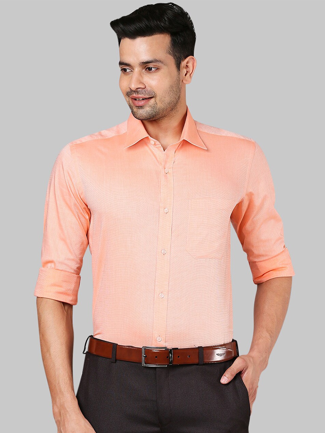 

Raymond Men Orange Solid Cotton Shirts