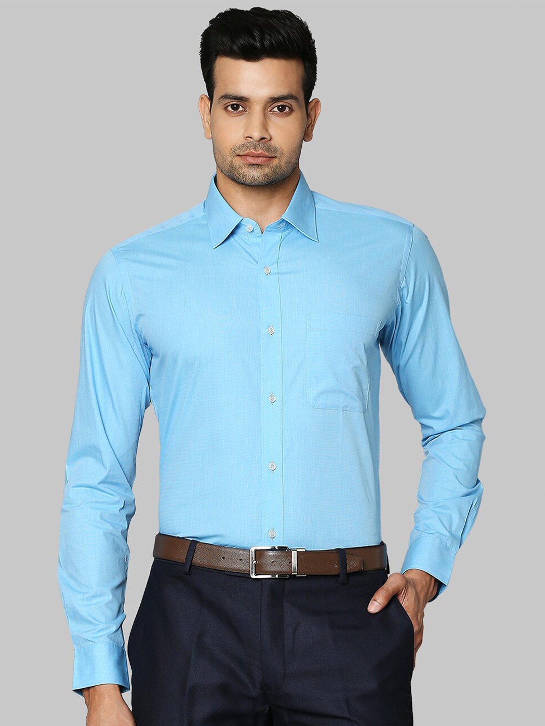 

Raymond Men Medium Petrol Blue Solid Shirts