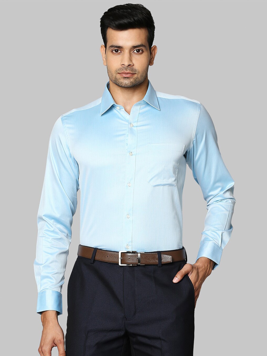 

Raymond Men Blue Solid Cotton Shirts