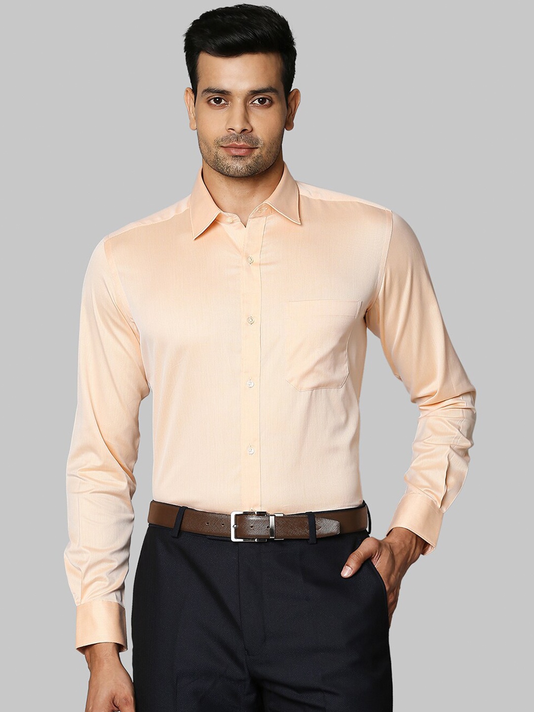 

Raymond Men Orange Solid Cotton Shirts