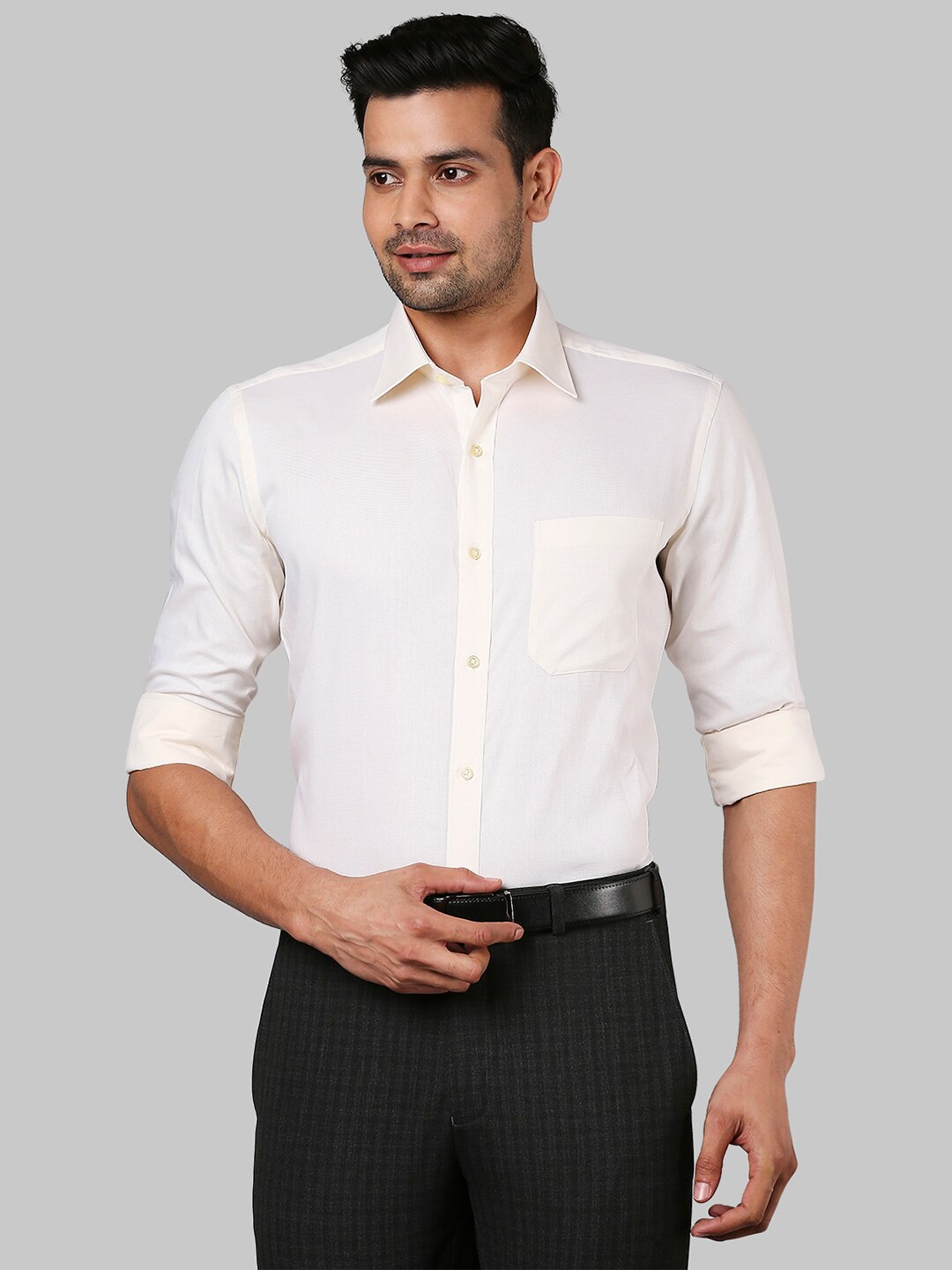 

Raymond Men Yellow Solid Cotton Shirts