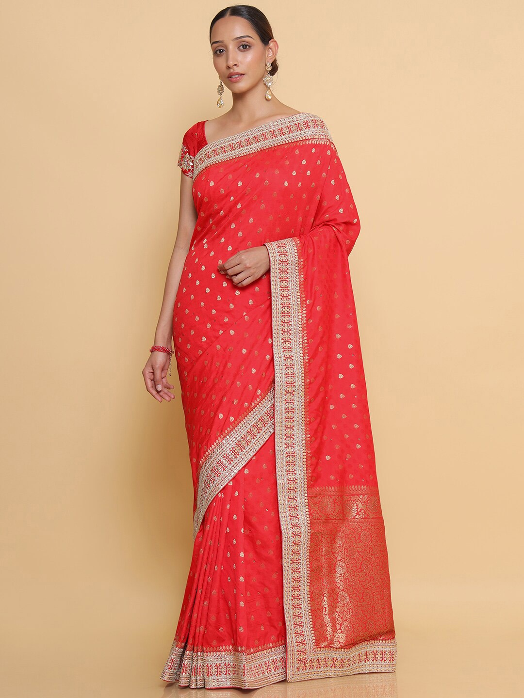 

Soch Red & Gold-Toned Embellished Zari Silk Blend Heavy Work Saree