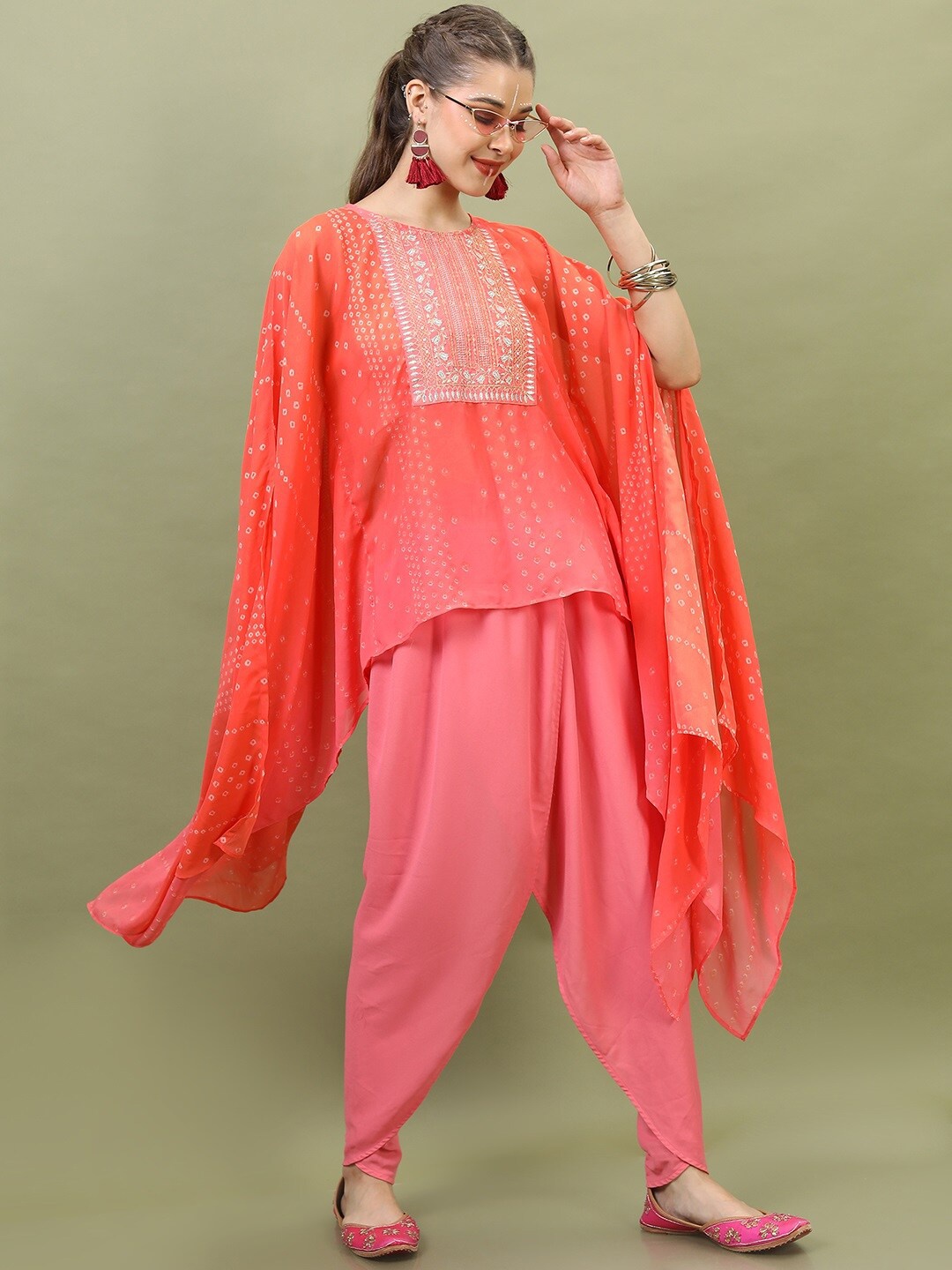 

Vishudh Women Orange Embroidered Gotta Patti Kurta with Dhoti Pants
