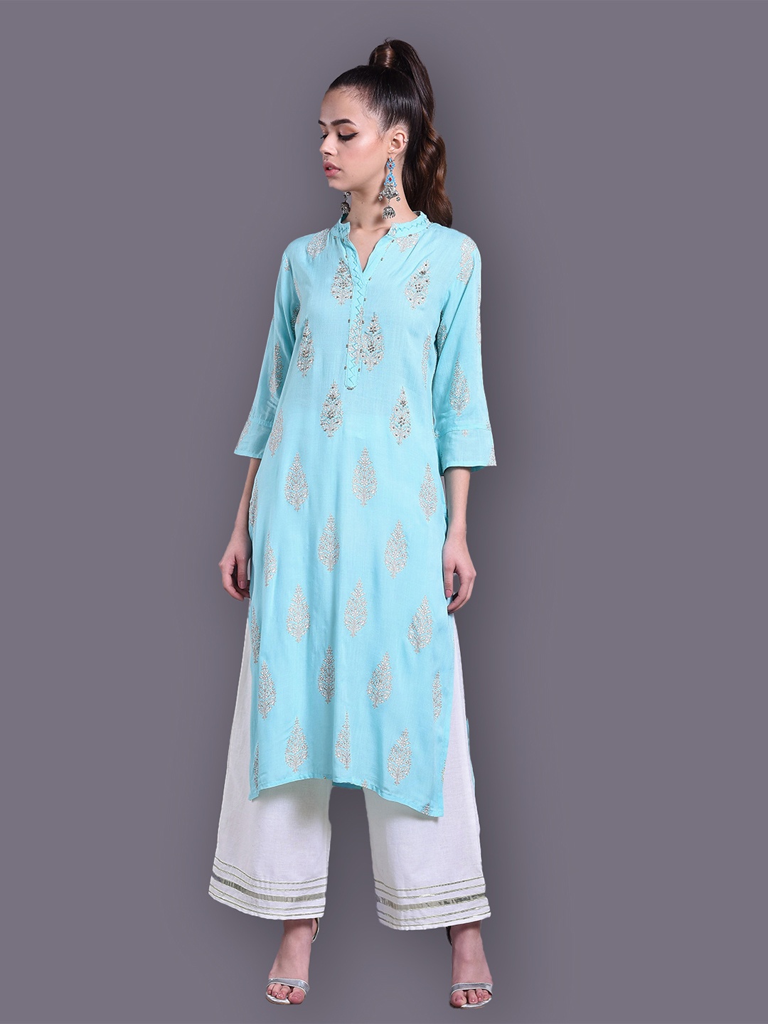 

DORIYA Women Blue Floral Yoke Design High Slit Kurti with Palazzos