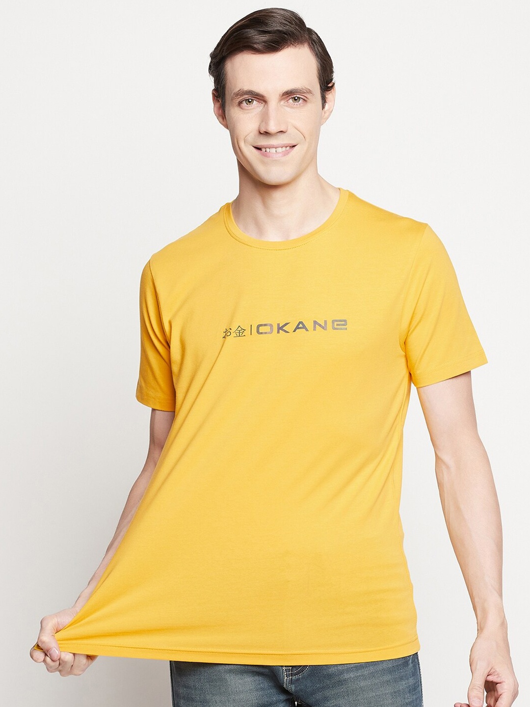 

Okane Men Yellow Typography Printed T-shirt