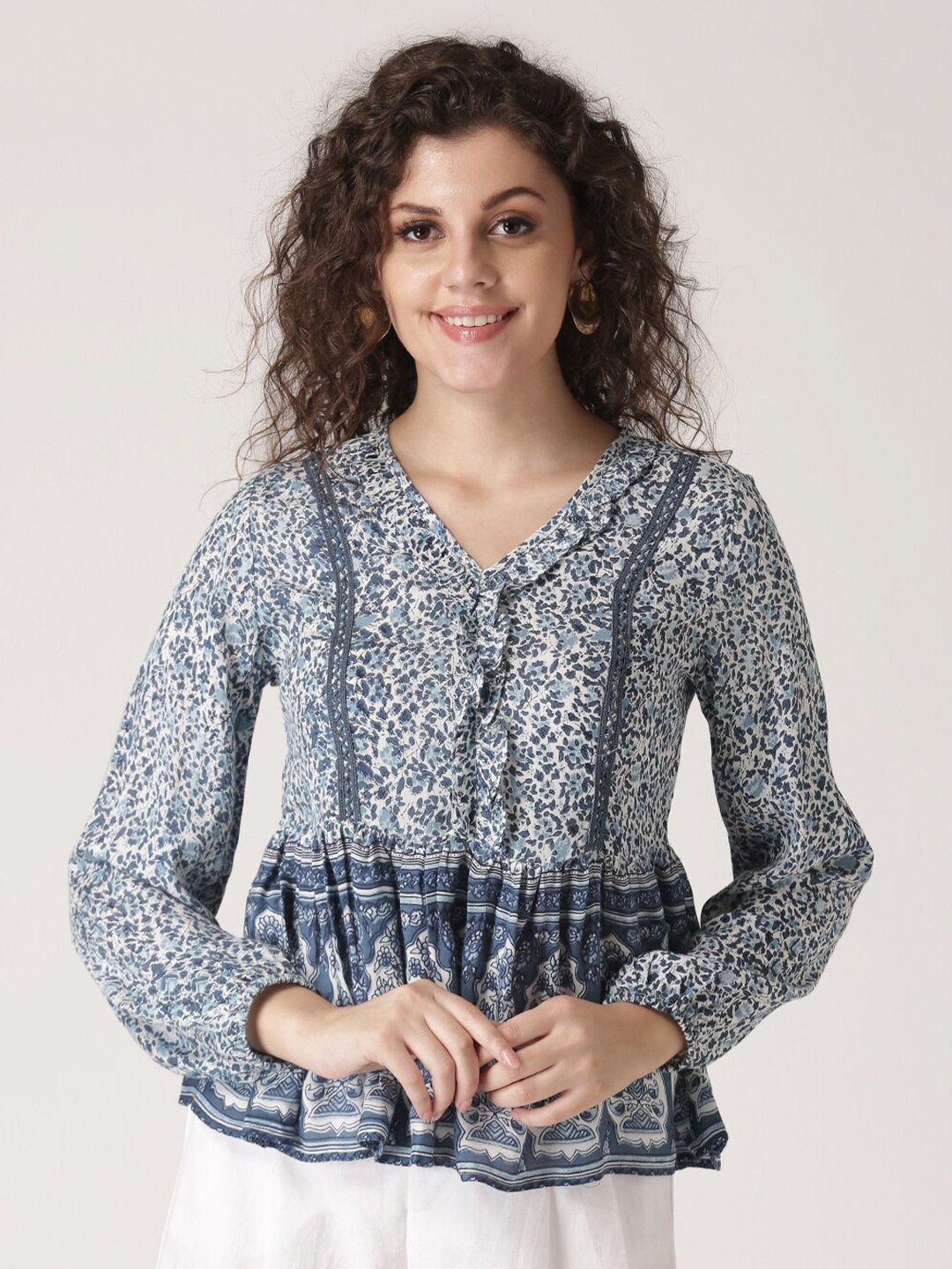 

DressBerry Women Blue Print Tie-Up Neck Peplum Top