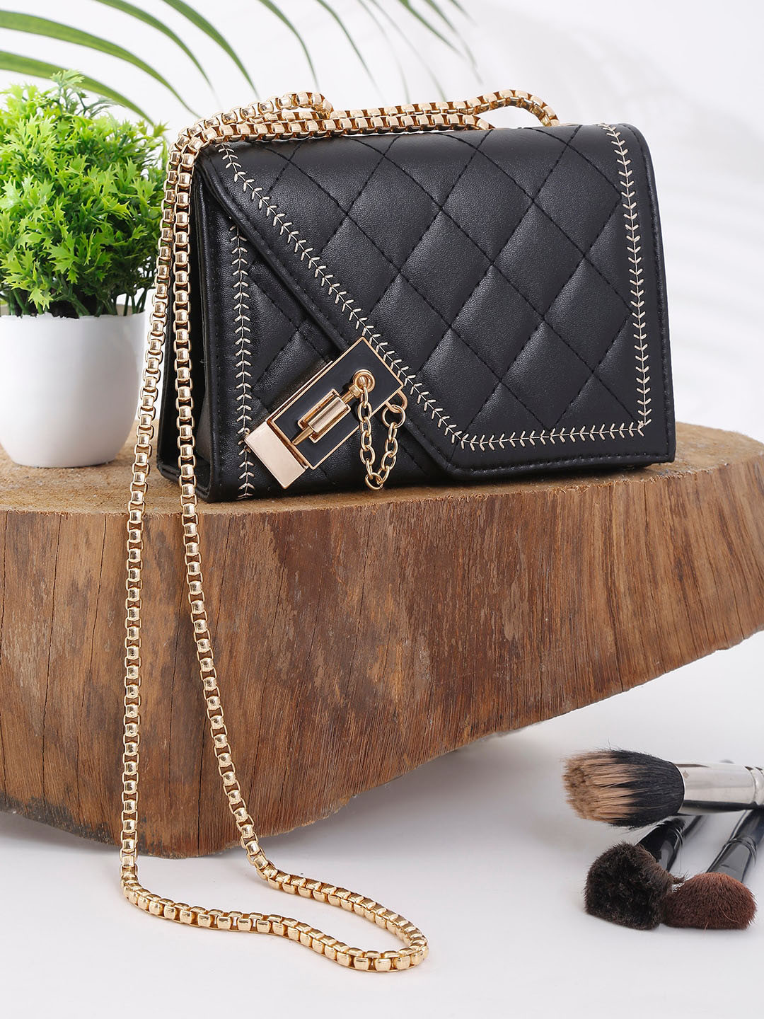 

Apsis Women Black Textured Sling Bag with Quilted